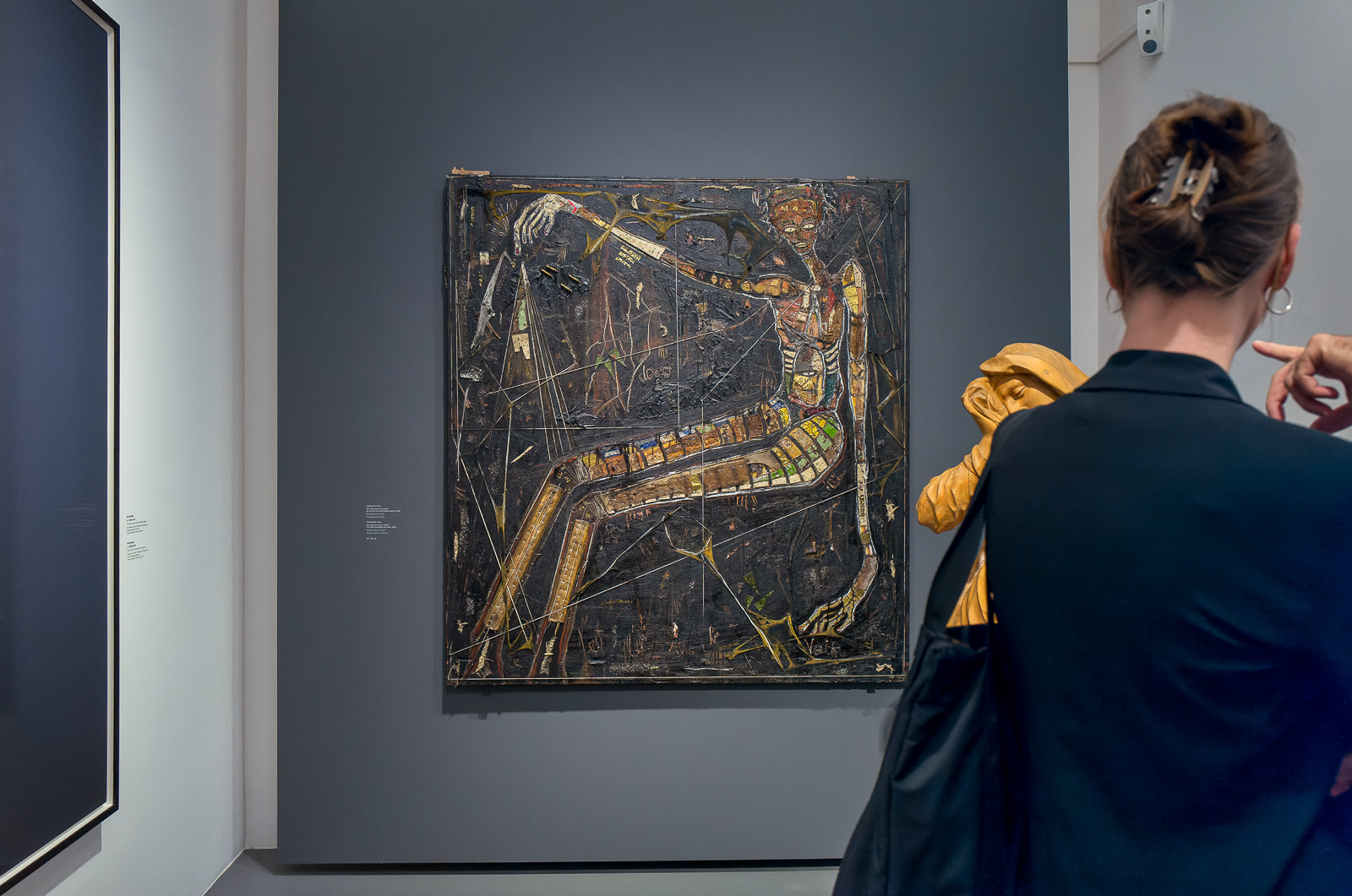 Painting of a skeleton by Alexandre Diop, mixed media on wood